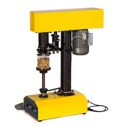 Aggraffatrice automatica per barattoli di latta